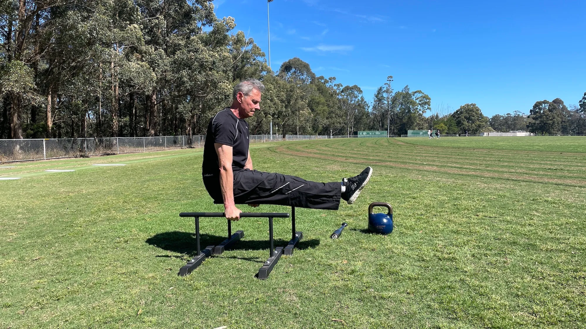 George exercising with weights